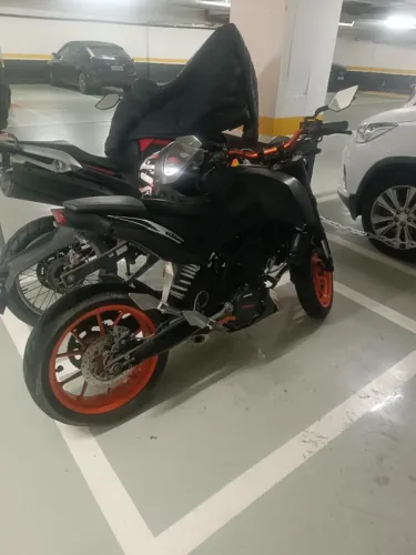 aceito troca por moto mais confortavel, chama que dá negocio