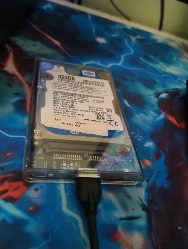 Hd externo de 320gb novo formatado.