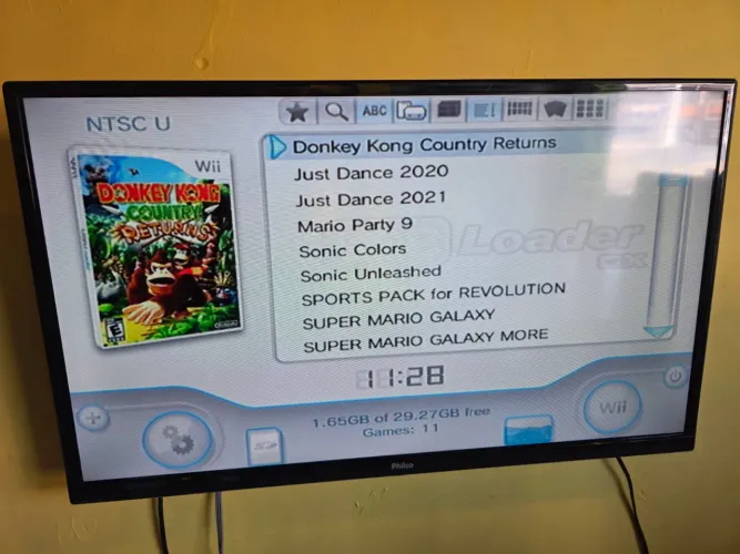Nintendo Wii preto na caixa, destravado com 10 jogos.