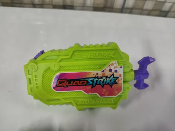 Lançador QuadStricke String F6778 Hasbro.