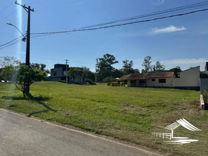 Ninho Verde 1, terreno área nobre contendo 450 m², frente ao asfalto e escritura registrad