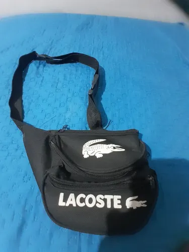 VENDO ESTA POCHETE DA LACOSTE