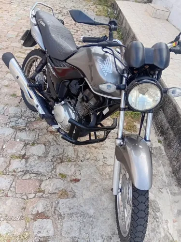 Vendo Moto Honda Fan 150 cc quitada,em dias no ponto de transferir.