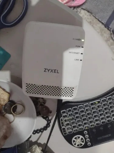 Roteador ZYXEL sem fonte entrego na estação