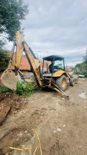 Retroescavadeira Newholland