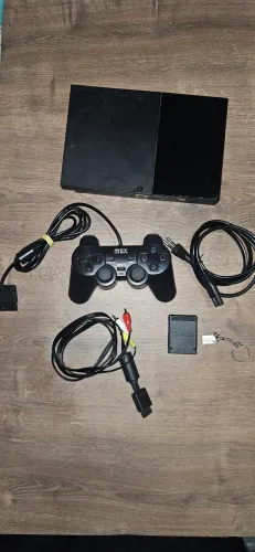 Vendo Playstation 2, funcionando e Lotado de jogos. Só pegar e jogar. Passo cartão.
