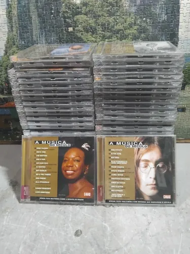 Coleção de CDs A música do século Revista Caras 50 volumes completa.