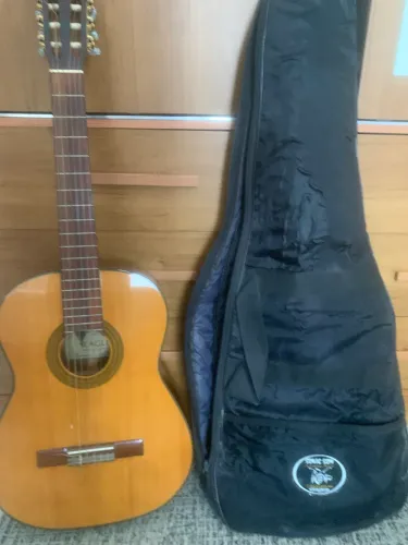 Violão Eagle DH-69 NT muito bem conservado, acompanha capa 