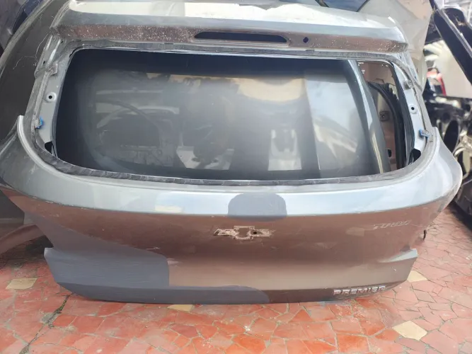 Tampa mala Onix Hatch 20/25