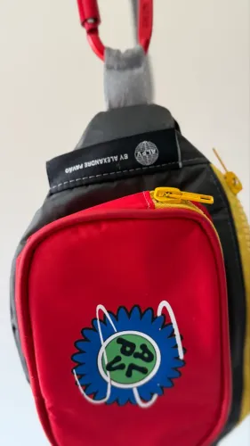 Pochete Alexandre pavão 