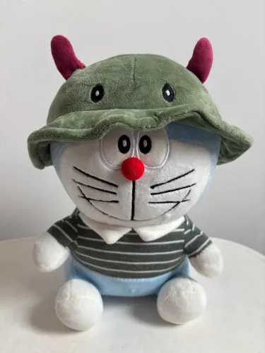 Pelúcia Doraemon com Chapéu de Dinossauro