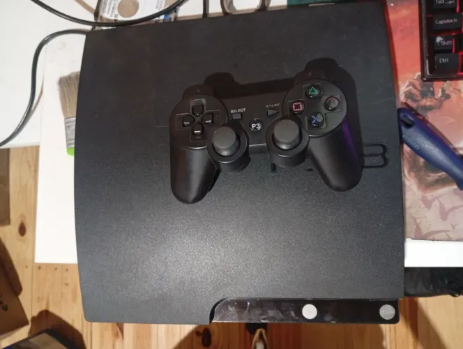 Ps3 slim 500 gb + de 13 jogos