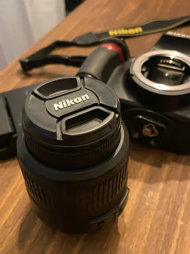 Nikon D3100 + mochila