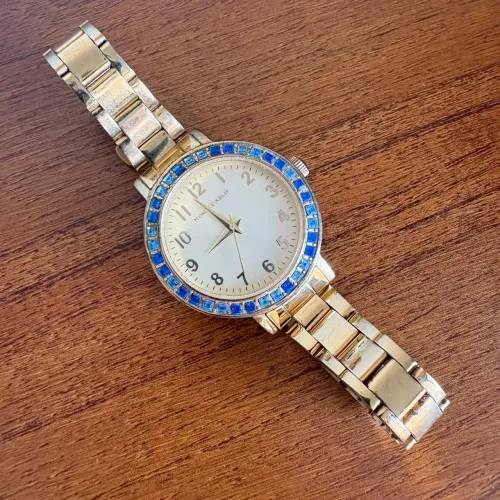 Relógio Feminino Monte Carlo Dourado - Visor circulado por belas pedras azuis (No Estado)