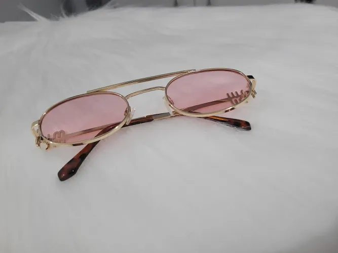 Óculos de sol rosa