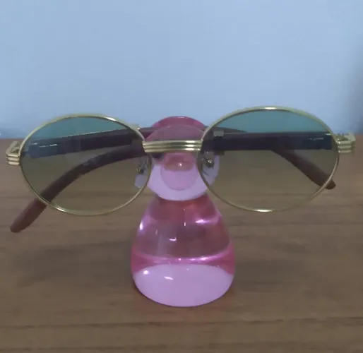 Óculos de Sol Oval Dourado | Lente Verde Claro 
