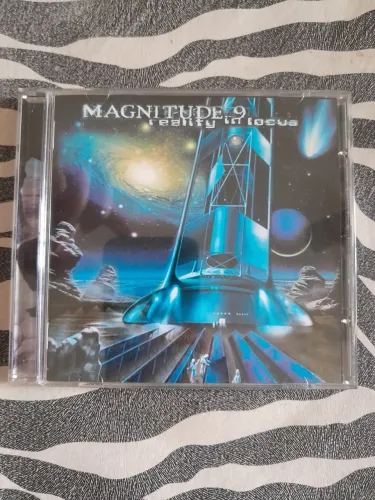 Cd Magnitude 9 - reality in focus