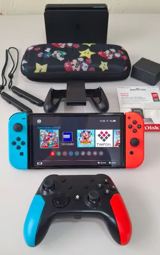 Nintendo Switch Oled Desbloqueado 256 GB + controle extra. Impecável