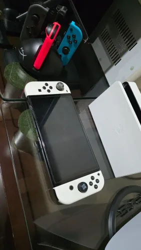 Nintendo switch Oled semi novo com caixa