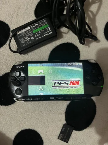 PSP 3010 com 52 jogos e 32gb de cartão 