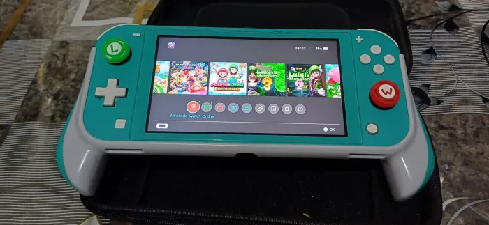 Nintendo Switch Lite [Cor do seu aparelho] - Desbloqueado (Sistema Atualizado)