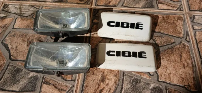 Par de Faróis de Milha Cibié Euro Serra com Capas Protetoras.