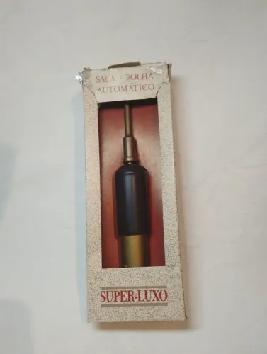 Antigo saca rolha automático