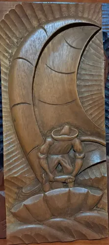 Quadro de madeira maciça.