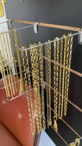 Correntes e pulseiras de moeda antiga 