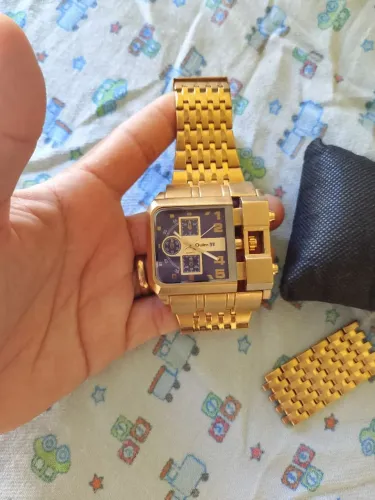 Vendo relógio dourado 