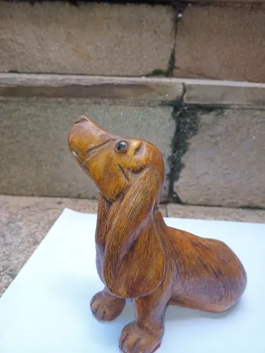 Estatua de cachorro em gesso