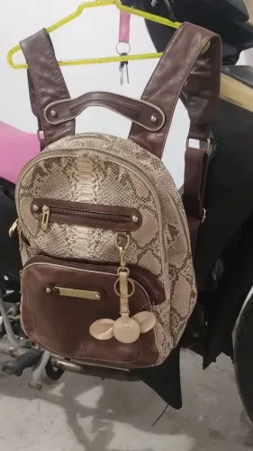 Mochila de grife Jorge Bischoff valor: 150 reais