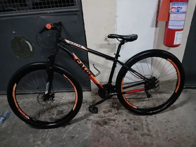 Bicicleta Caloi Vulcan Aro29 A20 - Preta/Laranja