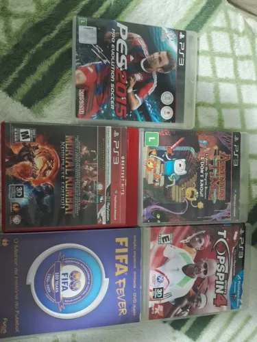 Cinco jogos de PS3 variados semi usados