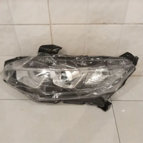 Farol esquerdo Honda g10