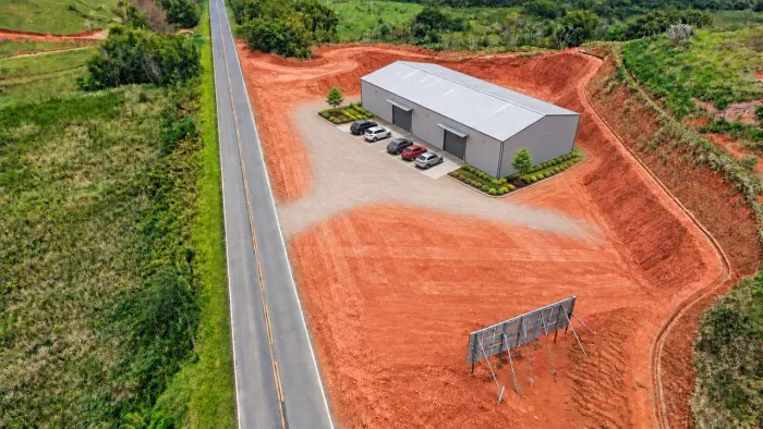 Lote comercial em goiana margem rod mg 353