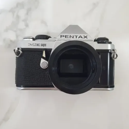 câmera pentax me super + lentes, filtros, flash e acessórios