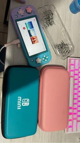 Nintendo switch lite seminovo, impecável e bloqueado