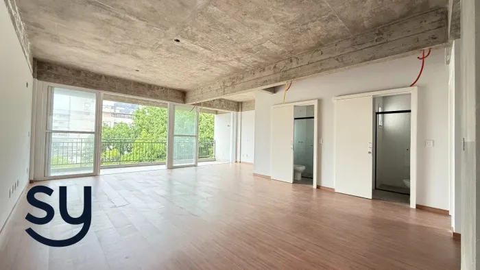 Apartamento em concreto aparente e churrasqueira