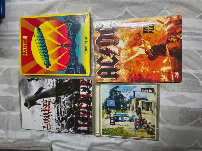 Coleção de 67 DVD e 17 Blu Ray de rock com aparelho Philips