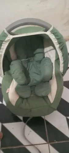 Bebê conforto e um ninho