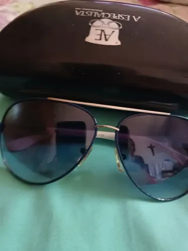 Oculos marca.Dior mande in italy  original. 