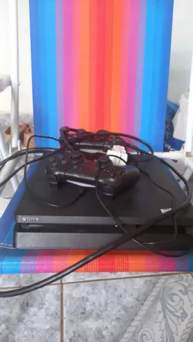 Ps4 slim 1 Tb , R$ 1800 .