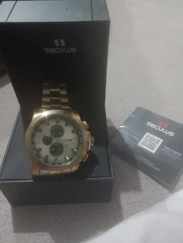Vendo relógio seculus na cor dourada , usado em excelente estado