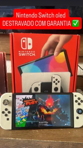 Nintendo Switch oled LOTADO DE JOGOS. Recebo seu console.