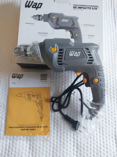 Furadeira e parafusadeira de impacto 127v 700w 10mm marca WAP nova sem uso