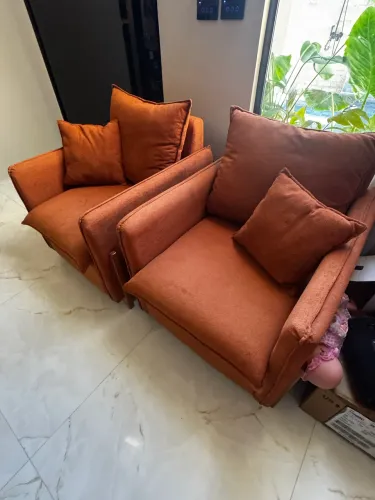 Poltronas em bouclê terracota