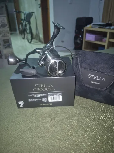 Molinete shimano stella c3000 xg, novo sem uso e knobs gomexus pra melhorar a performance