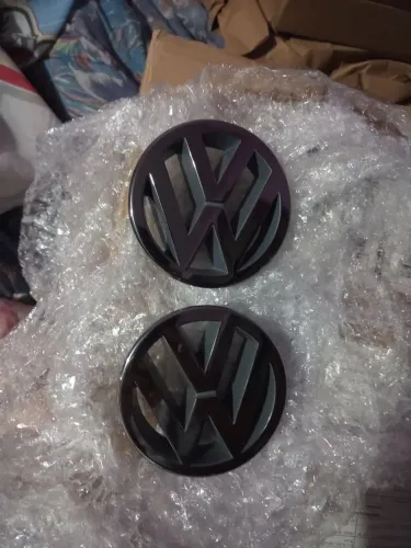 Emblema VW grade dianteira Gol Parati Saveiro G2 