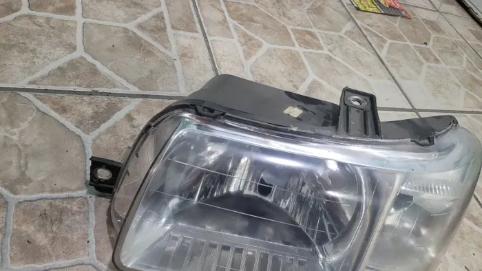Farol esquerdo original fiat uno pitbull 2003 em diante